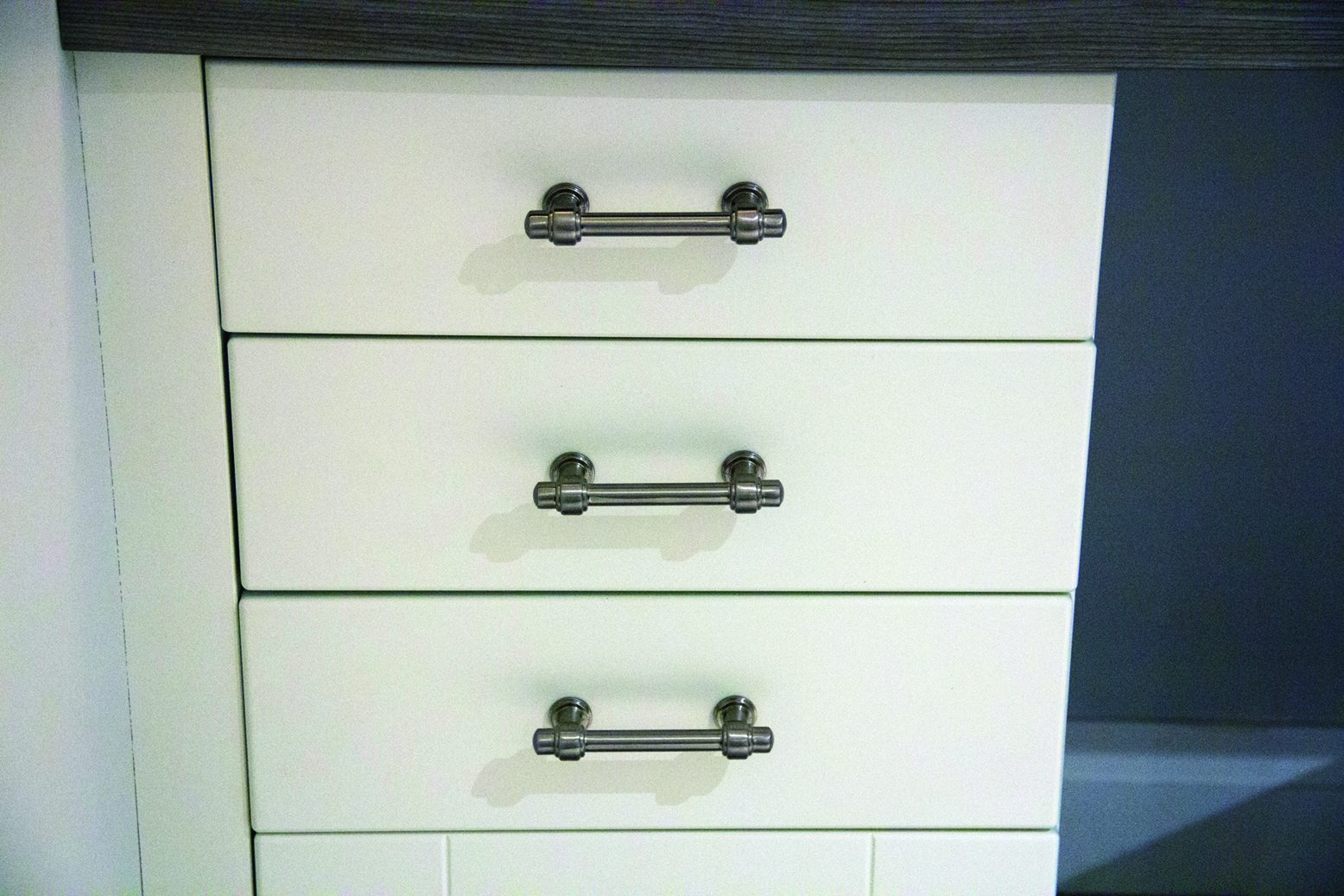 Atlas Homewares Bronte antique brass pulls on white drawers
