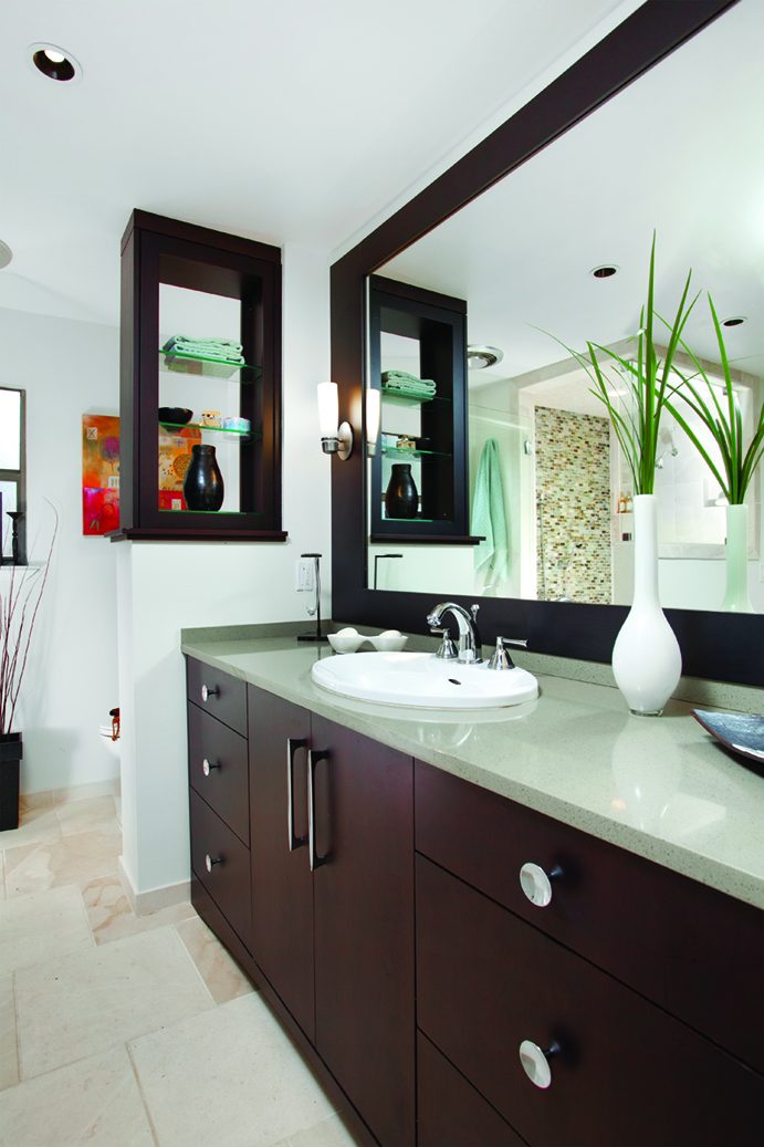 Atlas Homewares Dap chrome hardware on an espresso bathroom vanity