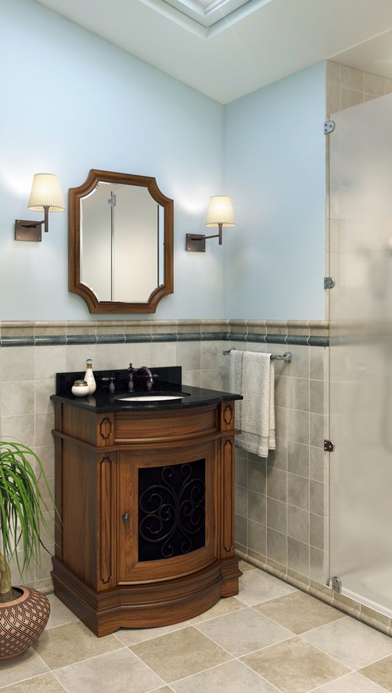 Hardware Resources vanity beside a glass shower enclosure