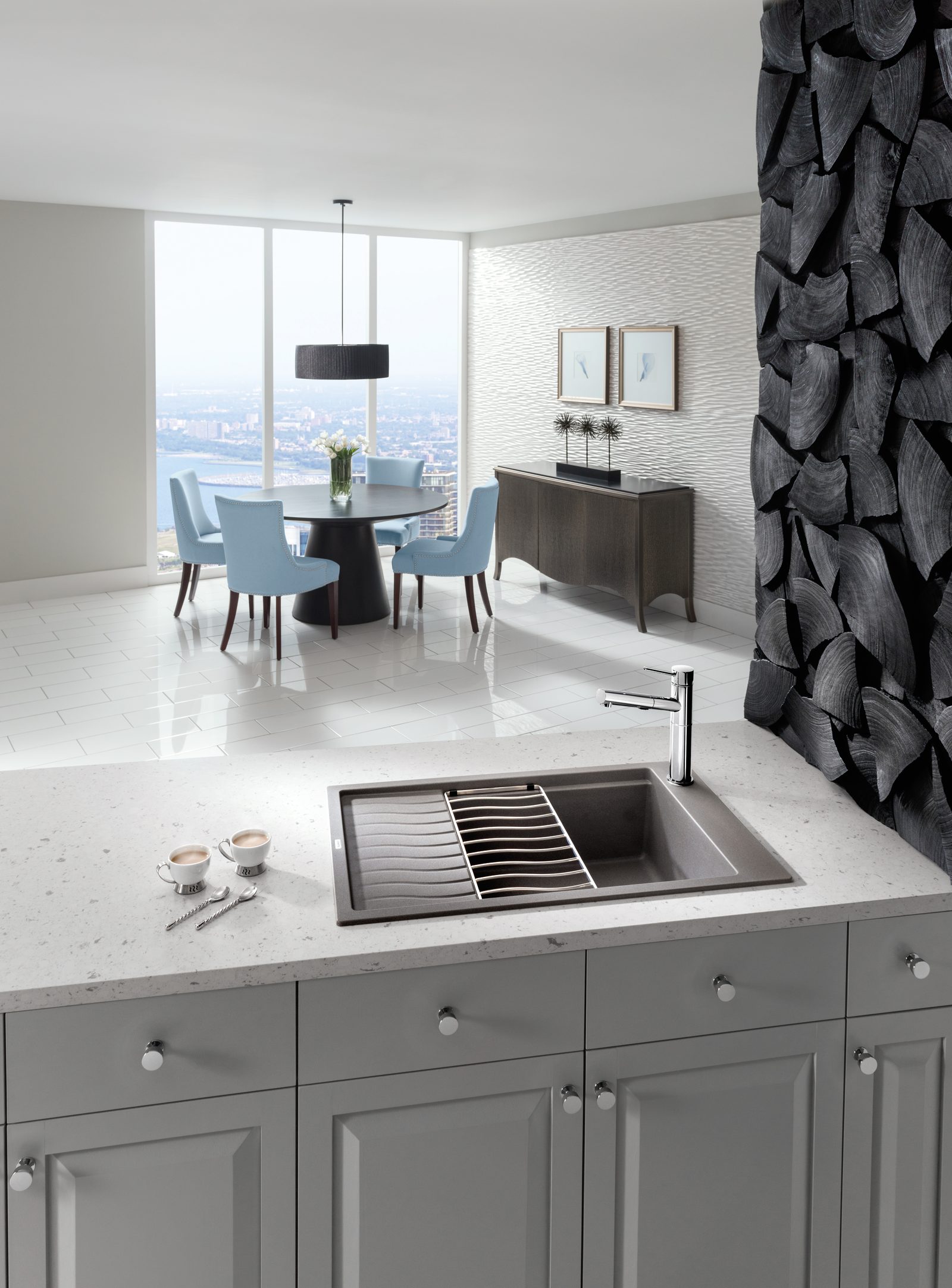 Top Knobs Elon hardware in a modern kitchen with a view