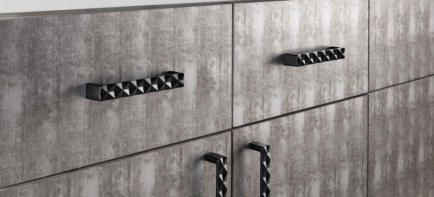 Top Knobs Mercer quilted pulls on textured cabinetry